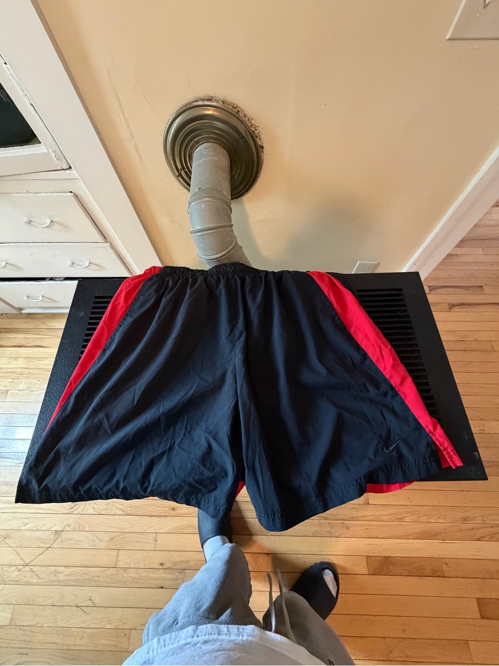 Nike Black Athletic Shorts with Red Side Panels